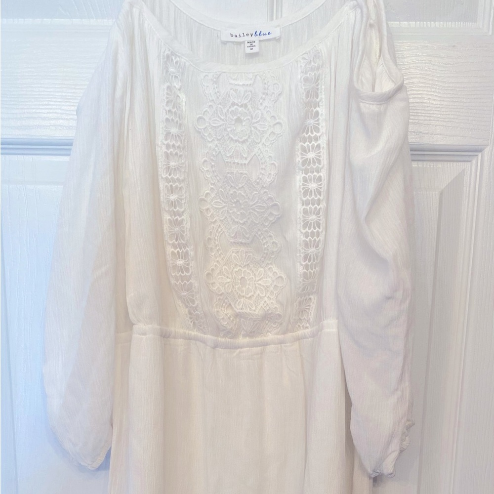 White thigh length dress